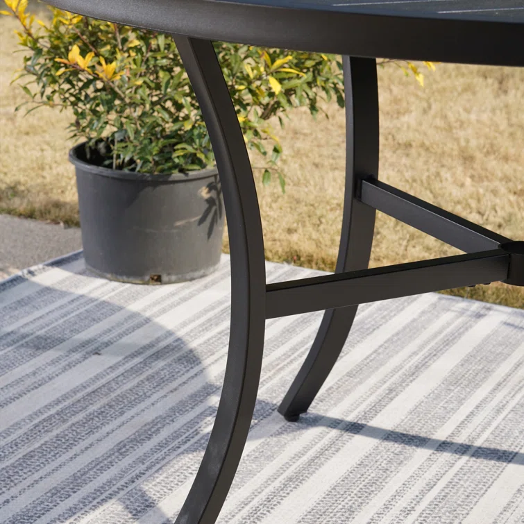 Alyah 4 - Person Round Outdoor Dining Set with Cushions
