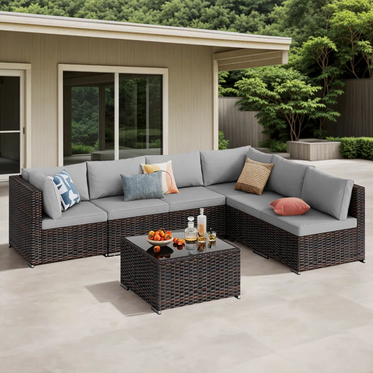 Silverts 7-Piece Slanted Back Rattan Sectional Seating Group
