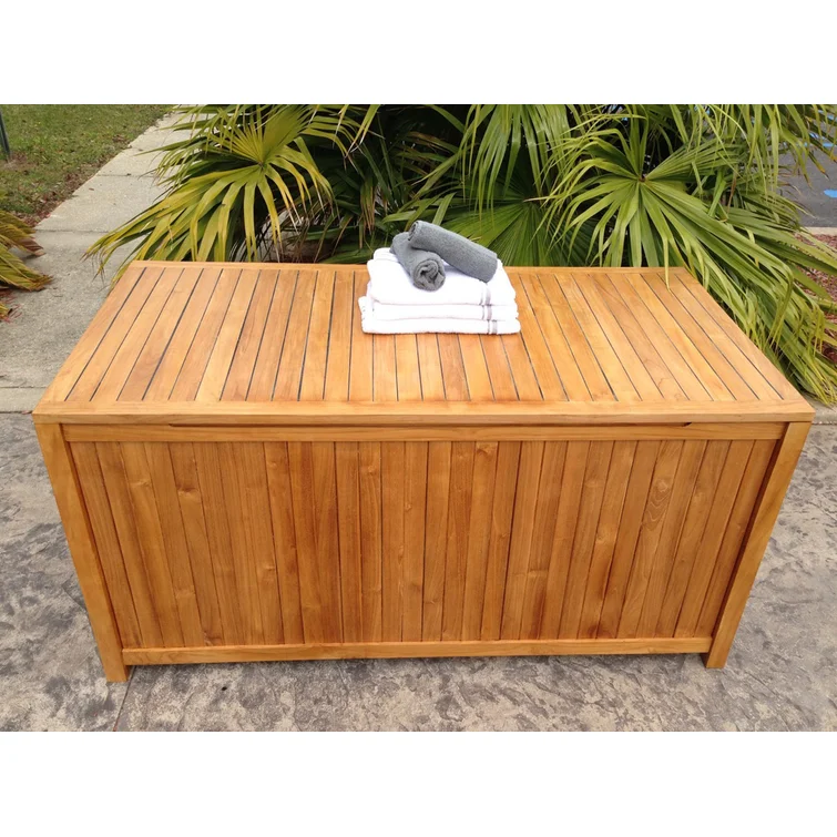 Bay Isle Home™ Everleigh 63'' W Water Resistant Solid Wood Teak Deck Box in Honey Tone Teak