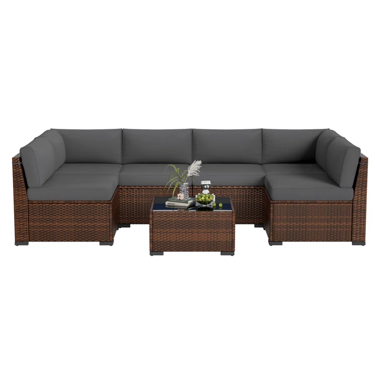7 Piece Rattan Sectional Seating Group with Cushions