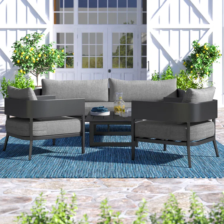 Elza 4 Piece Outdoor Conversation Set in Dark Gray Aluminum with Cushions