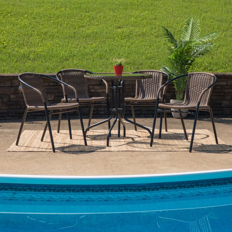 28'' Round Glass Table with Rattan Edging and 4 Rattan Stack Chairs