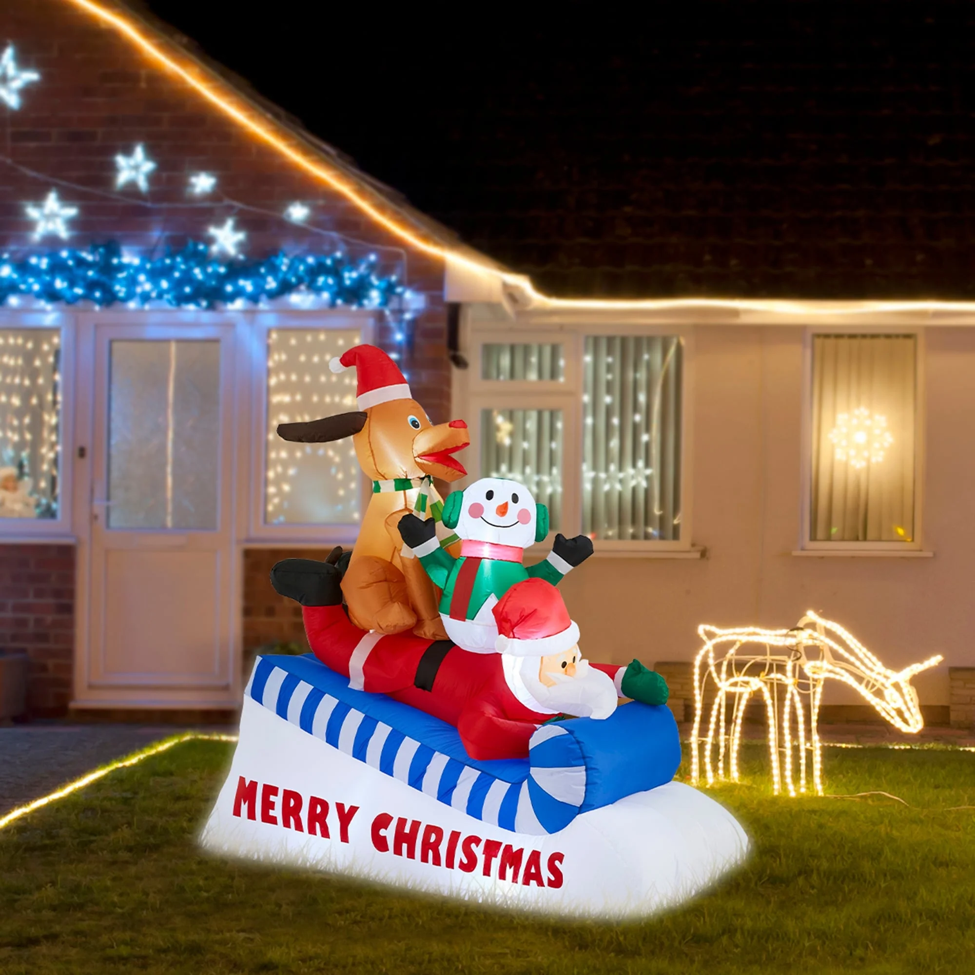 Glitzhome 6FT Lighted Inflatable Skiing Santa, Snowman and Dog Decor - multi