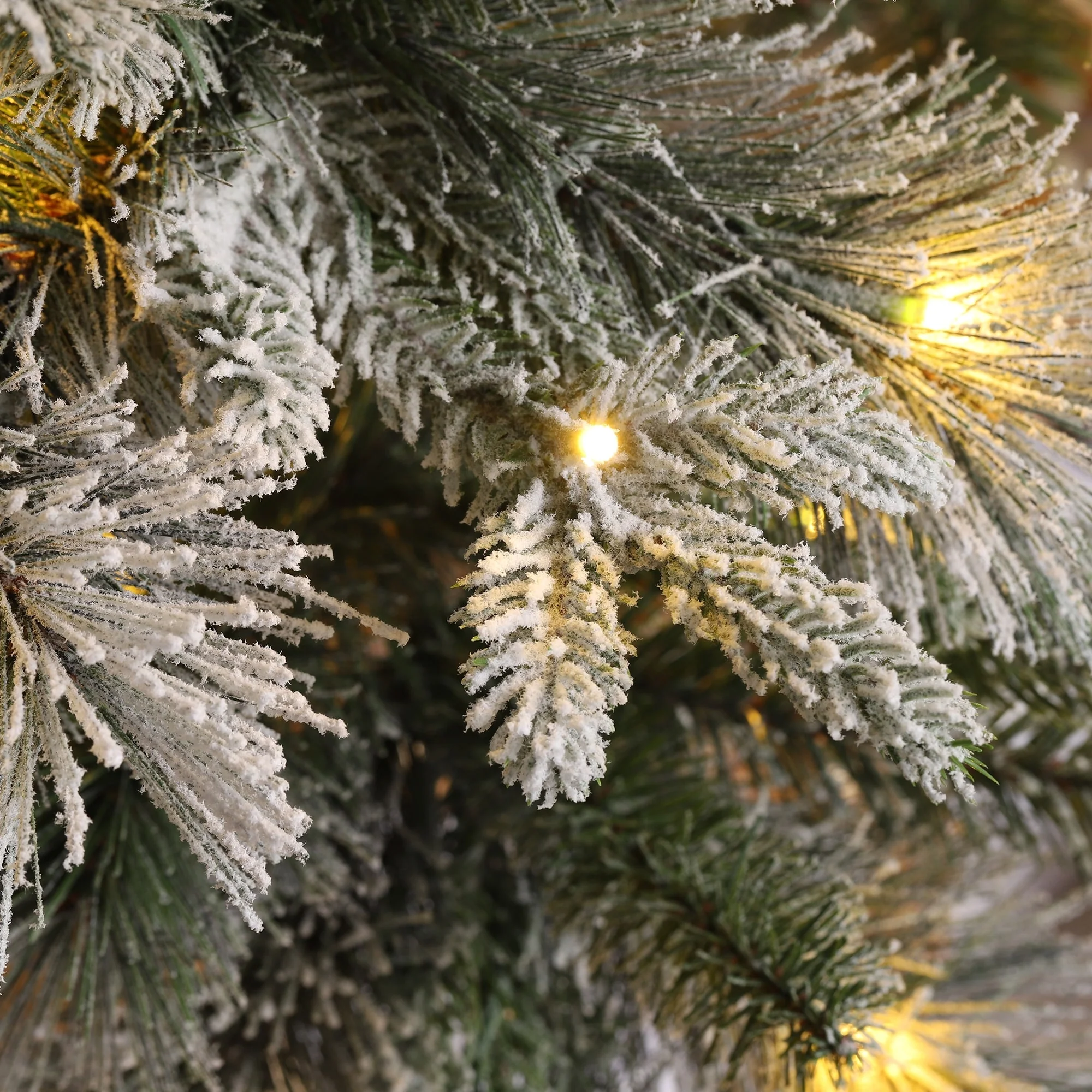 Glitzhome 7.5ft/9ft/11ft Pre-Lit Flocked Slim Pine Artificial Christmas Tree w/ Foot Pedal & Remote Control