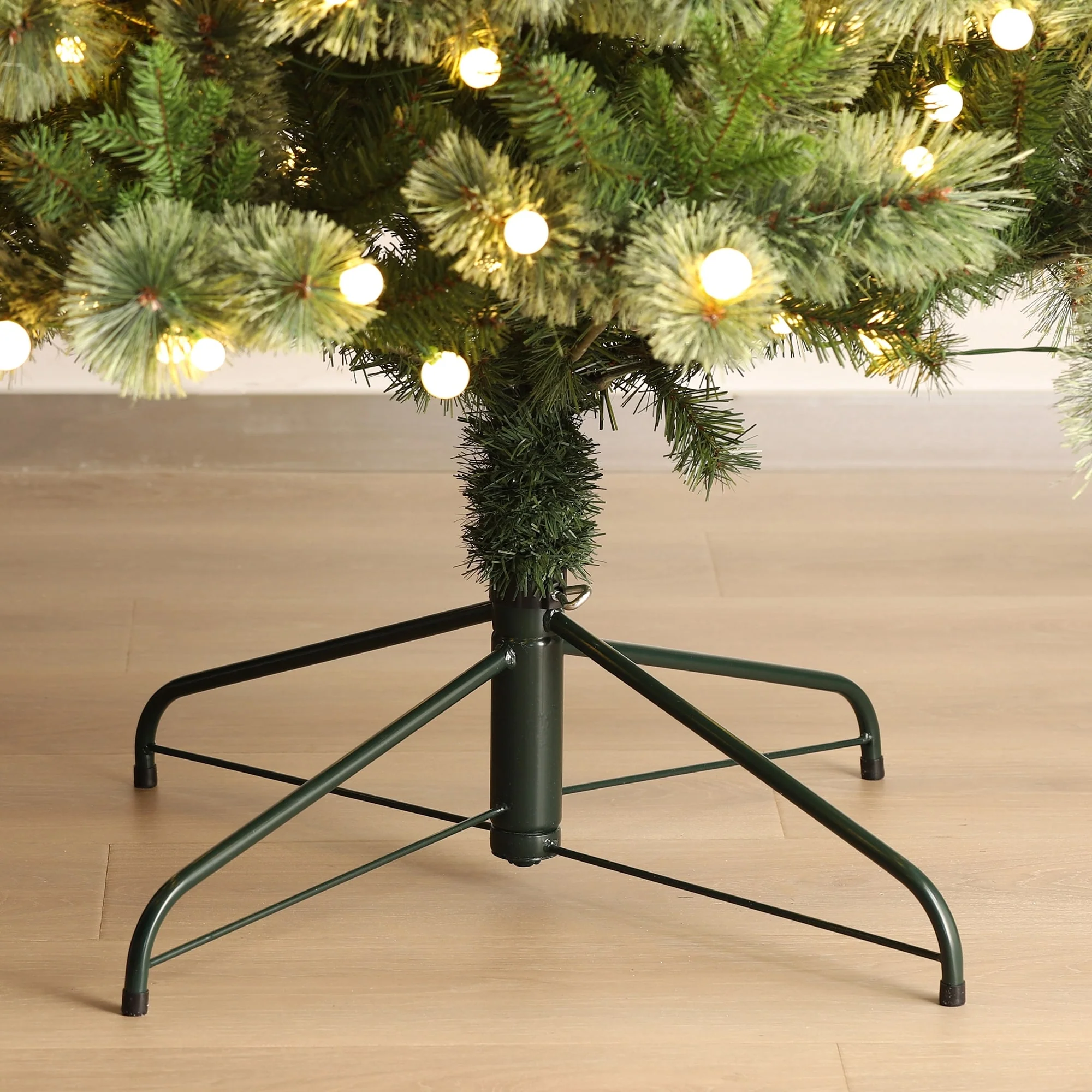 Glitzhome 7.5ft/9ft Pre-Lit Green Slim Pine Artificial Christmas Tree with Foot Pedal & Remote Control